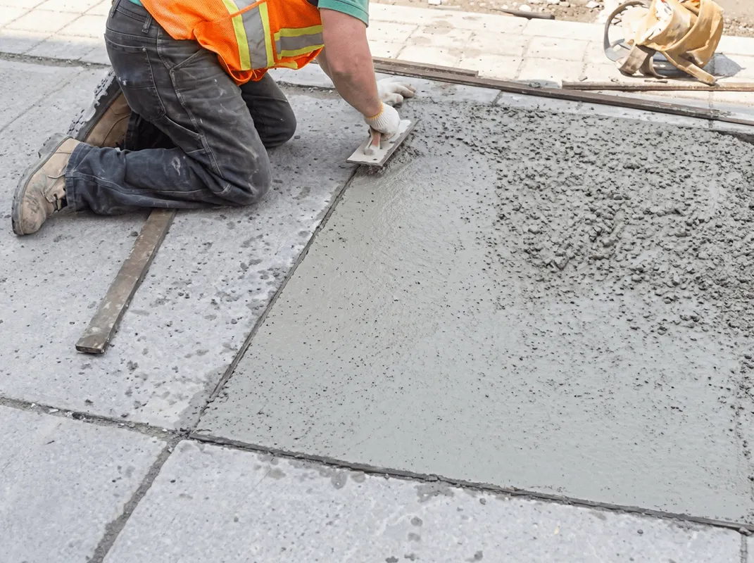 Professional repairing a concrete floor in Portland, OR